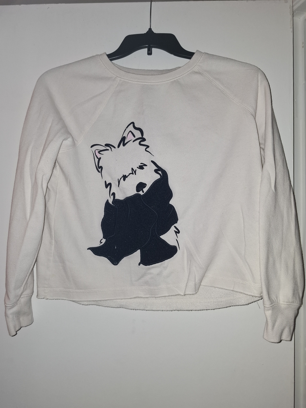 Justice Cream Sweatshirt with Black Puppy Graphic
